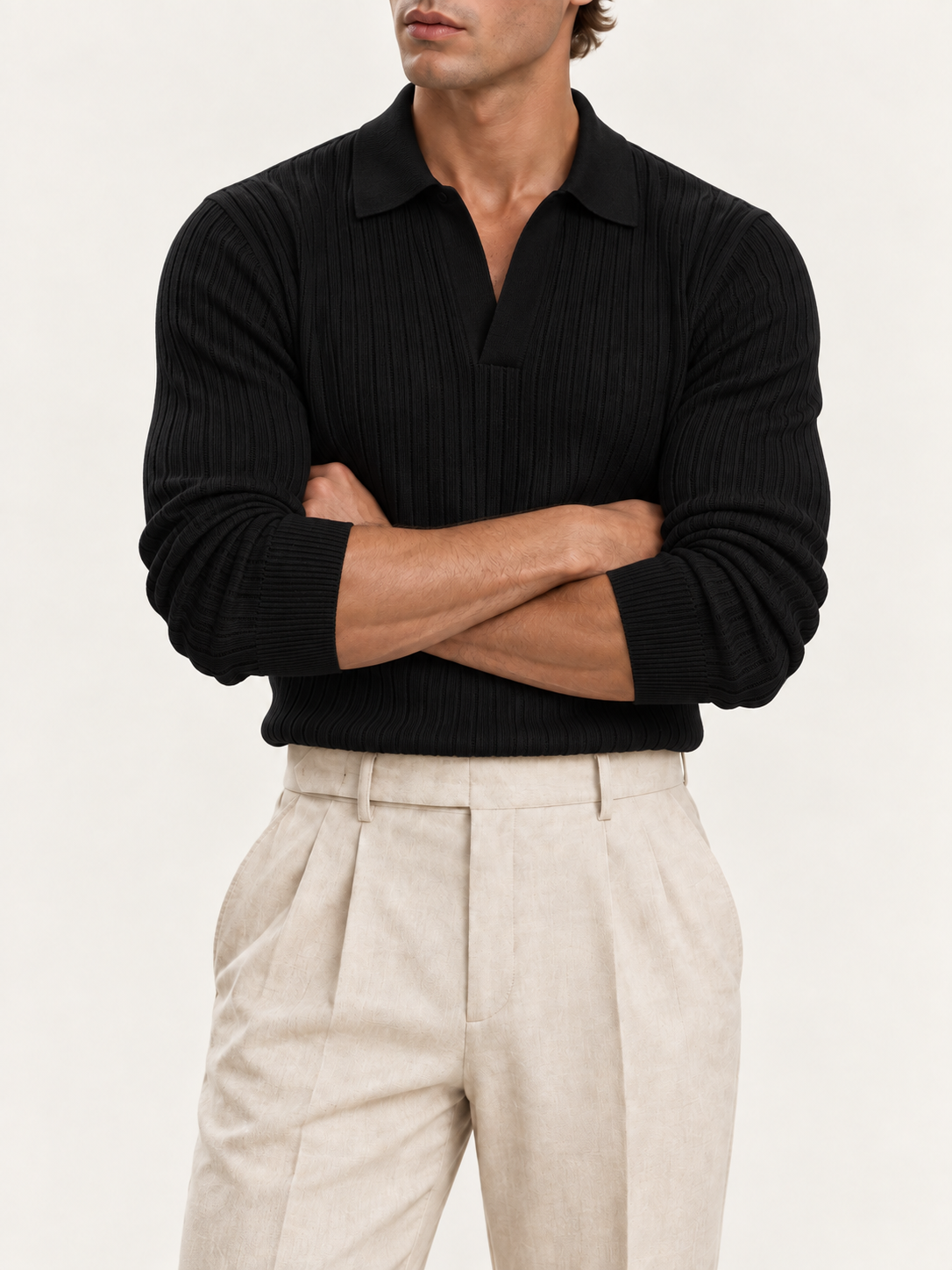 The Long Sleeve V Collar Polo — BLACK — 06-arms-crossed — studio 20260914 clean replacement