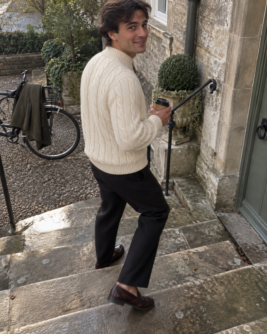 Beige Jacquard Mock Neck Sweater worn on old garden steps