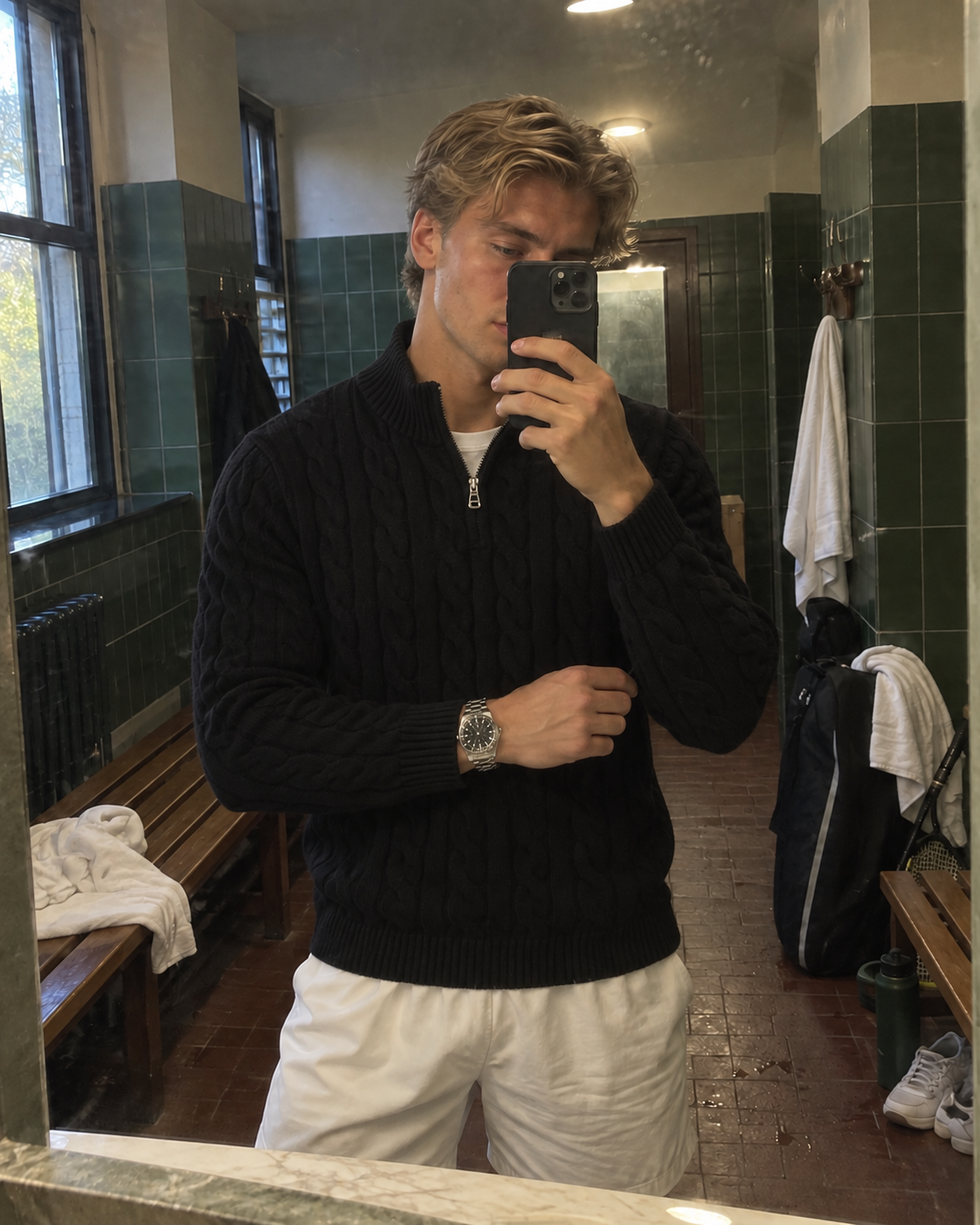 Black Jacquard Mock Neck Sweater worn in a changing room mirror